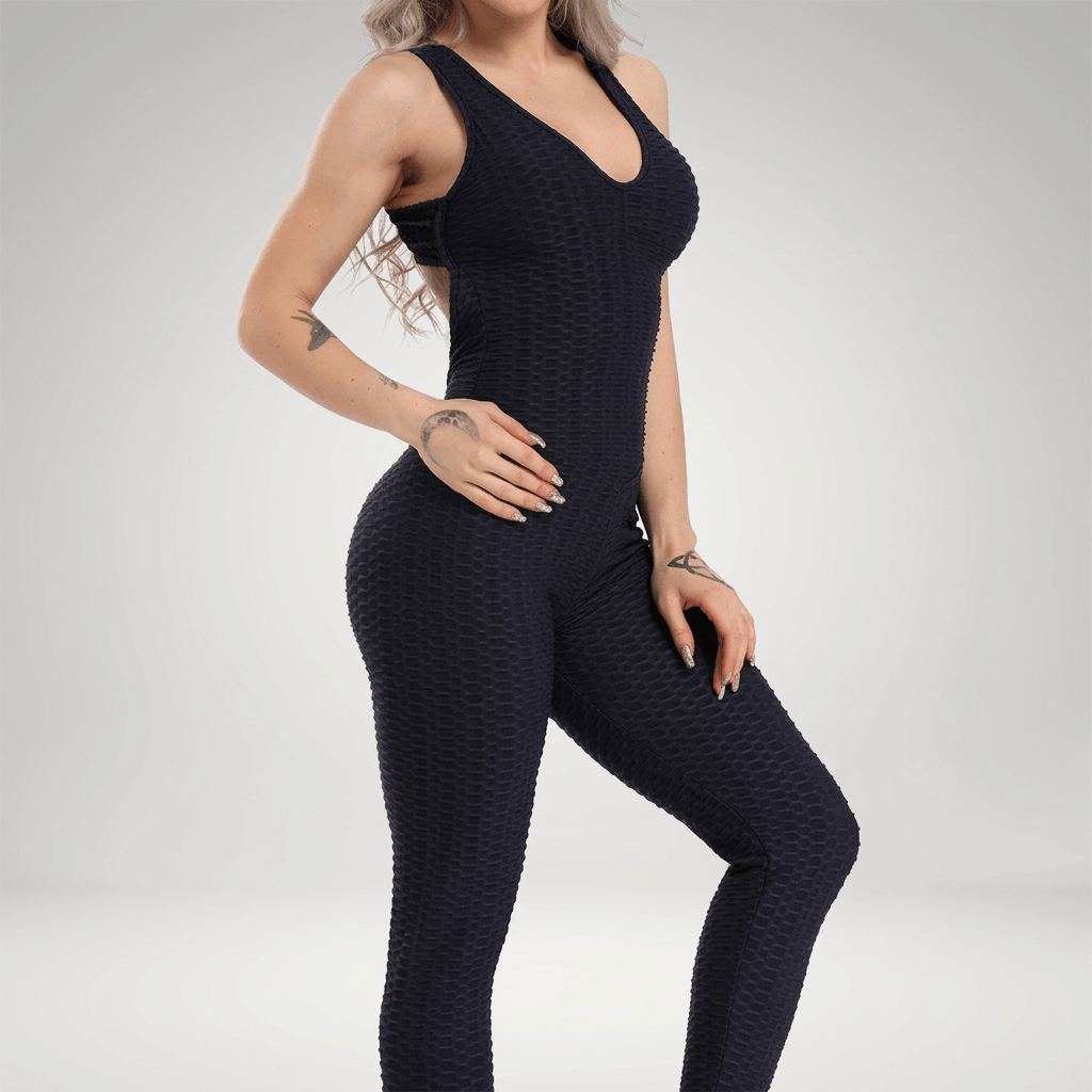 Blue Yoga jumpsuit worn by a fit women with v neckline