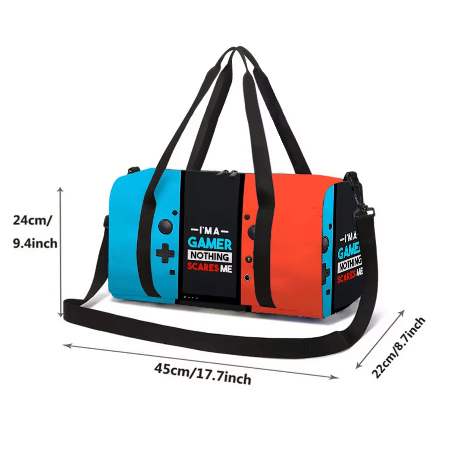 A duffel bag designed to look like a Nintendo Switch console, featuring a blue left Joy-Con, a black center section with text, and an orange right Joy-Con. The bag has black handles and a black shoulder strap, and the image includes dimension lines showing its measurements.