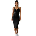 Woman wearing a black dress on a white background