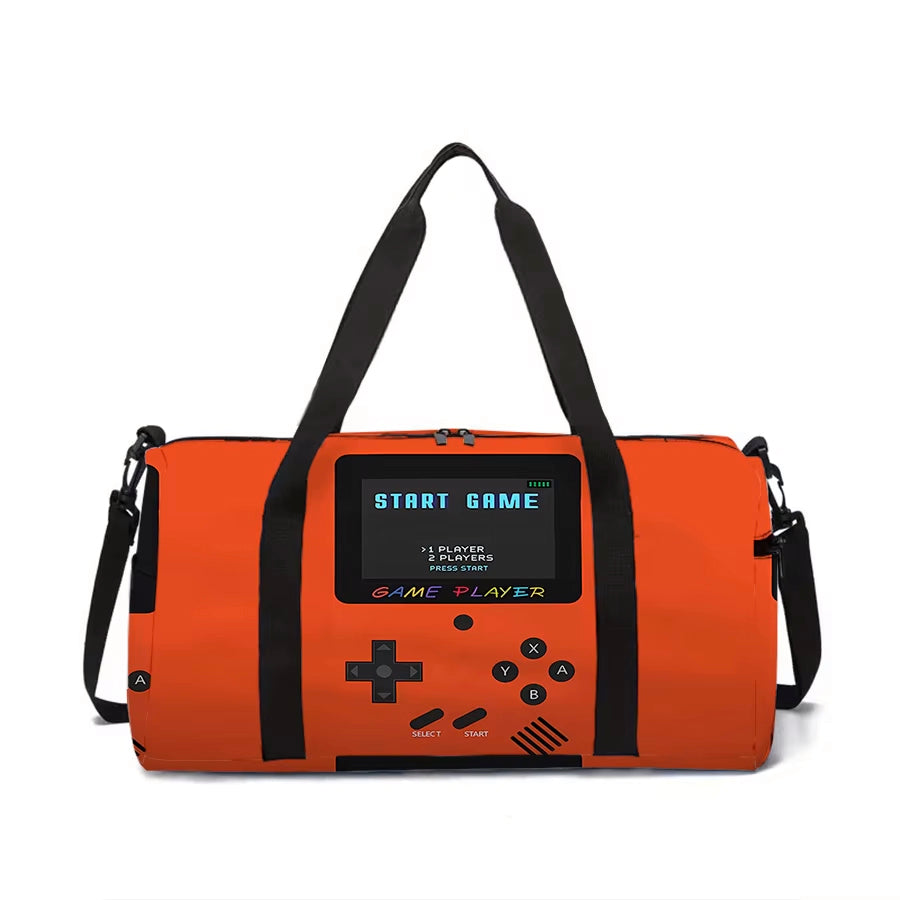 An orange duffel bag designed to look like a retro handheld game console, featuring black handles and straps, with a screen displaying 'START GAME'.