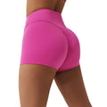 A pair of high-waisted dark pink scrunch shorts designed for gym and everyday wear, highlighting a booty lifting design.