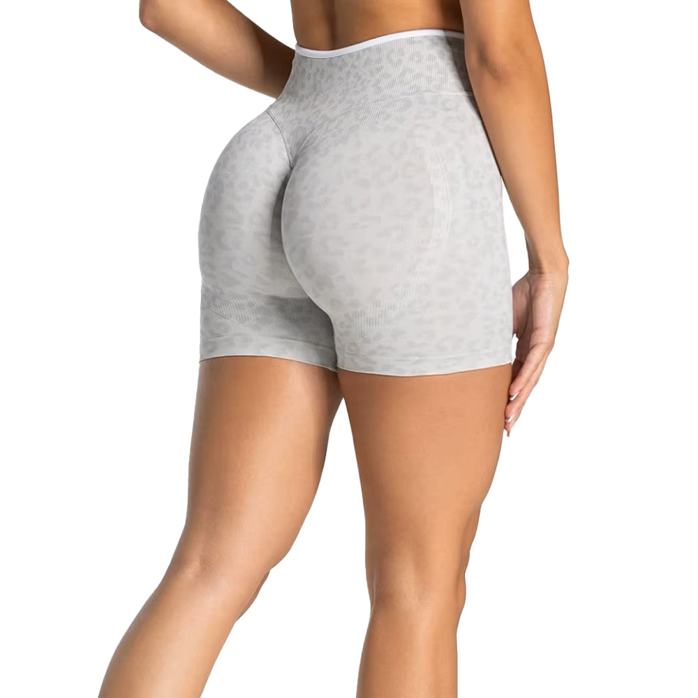 Gray shorts worn by a person on a white background