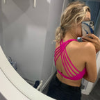 girl taking selfie in hot pink womens crop top