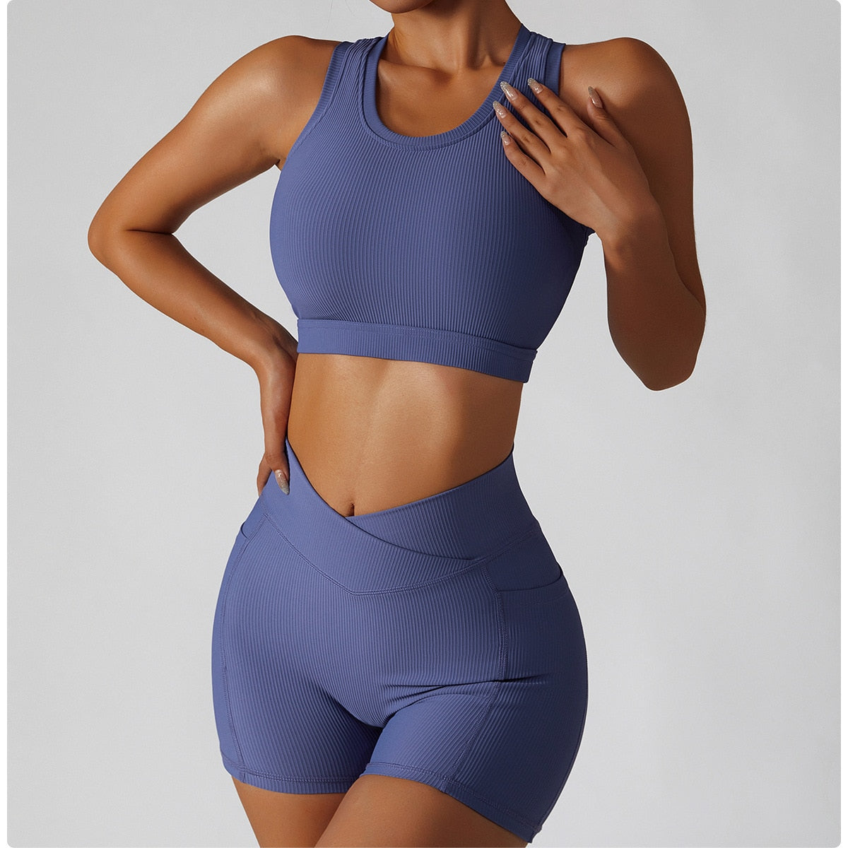 blue crop top and red shorts with pocket activewear set australia