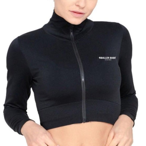 Women wearing black cropped jacket with zipper
