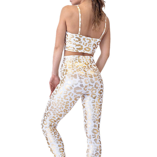 women posing with leopard print leggings and crop top
