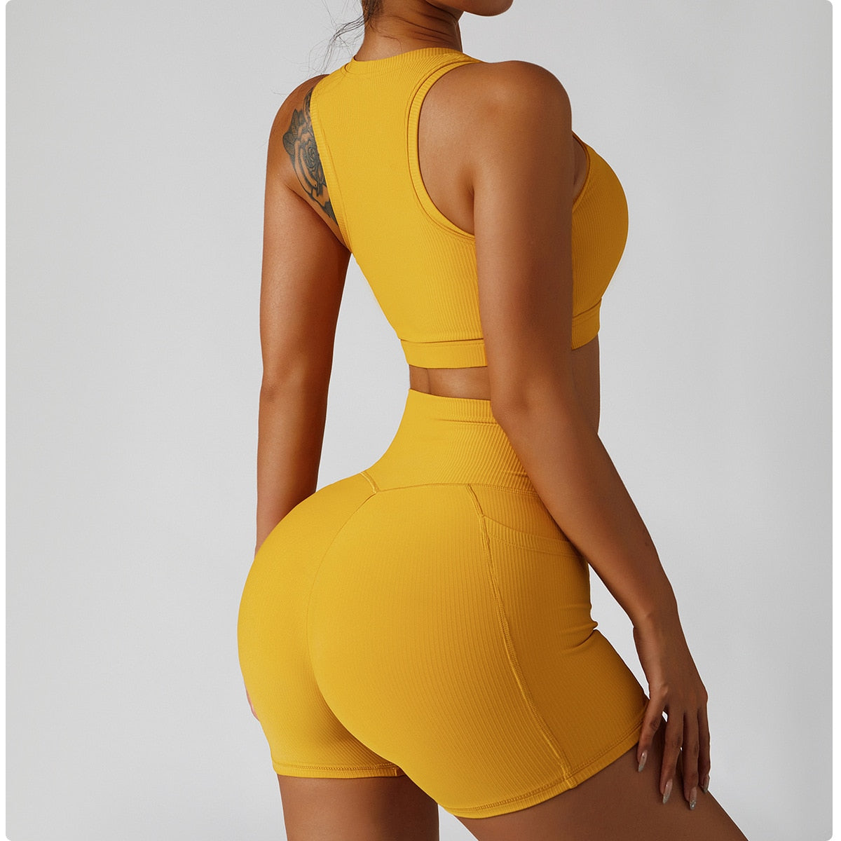 yellow crop top and red shorts with pocket activewear set australia